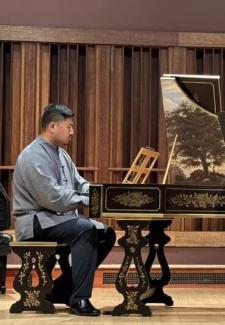 Zhengyi Hou